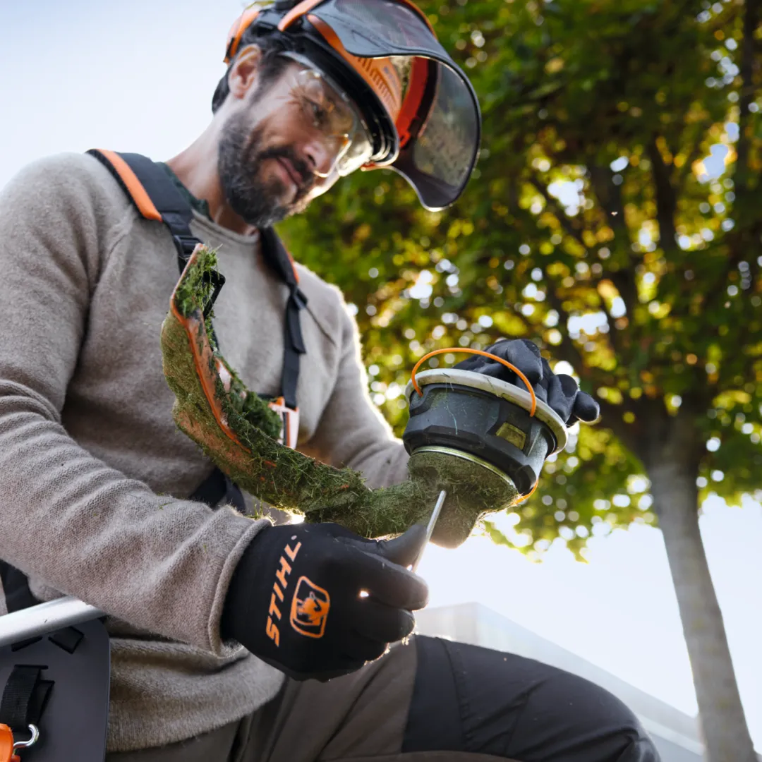 Démontage d'une tête à fil STIHL