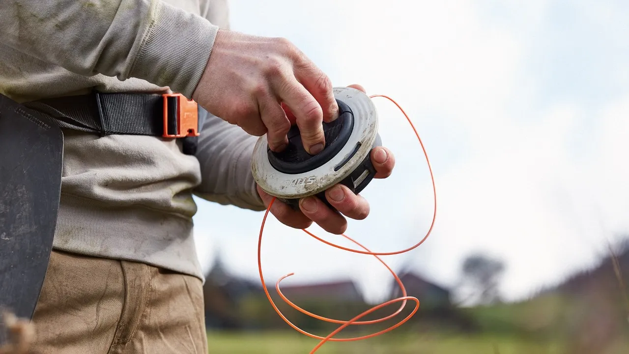 Changement bobine fil tête STIHL